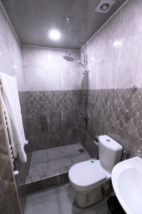 Karnel Hotel Sanain Bagian luar foto