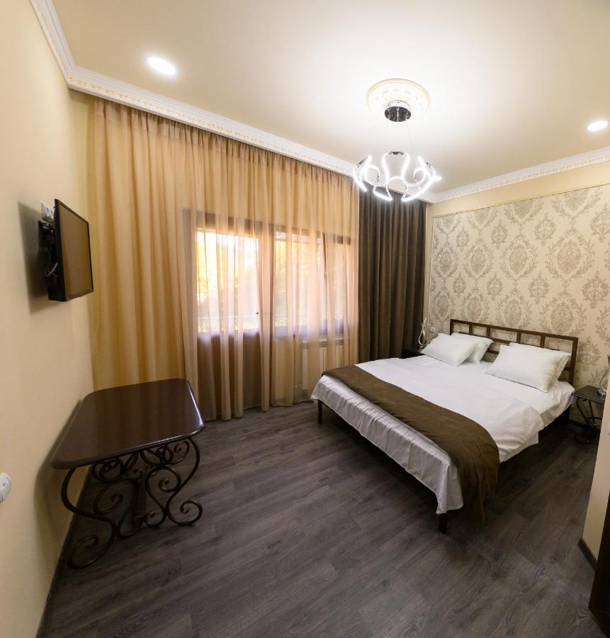 Karnel Hotel Sanain Bagian luar foto